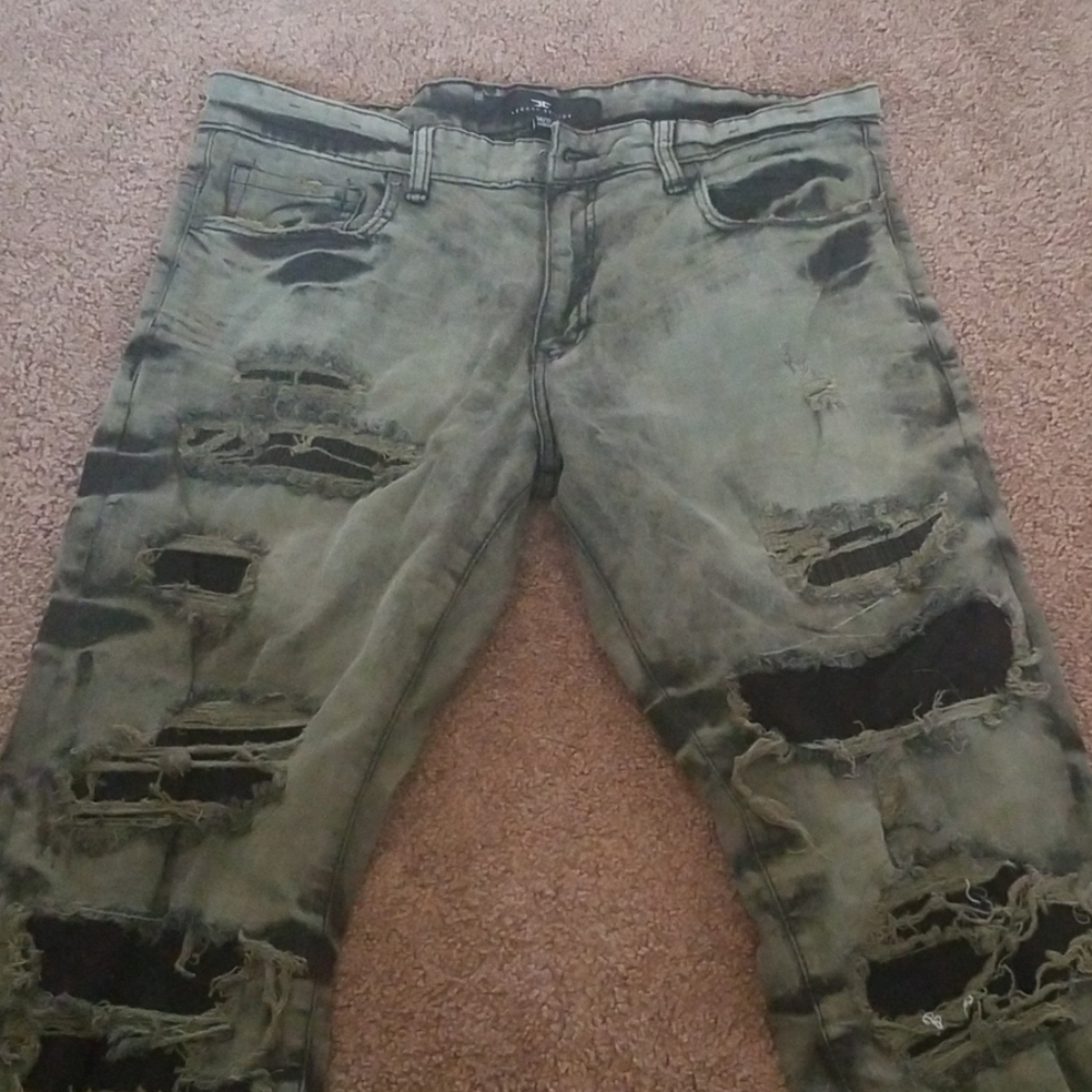 Distressed designer jeans